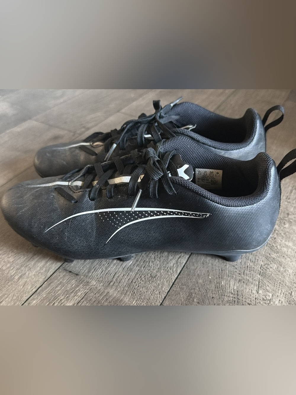 Kids Black Athletic Soccer Cleats with White Accents